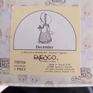 Enesco Precious Moments December Figurine